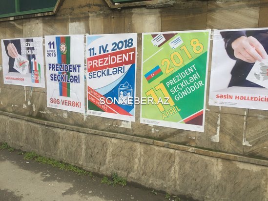 Azərbaycanda prezident seçkiləri ilə bağlı afişaların divarlara vurulmasına başlandı - FOTOLAR
