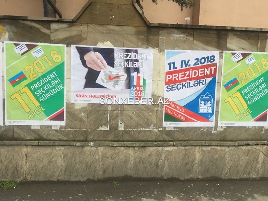 Azərbaycanda prezident seçkiləri ilə bağlı afişaların divarlara vurulmasına başlandı - FOTOLAR