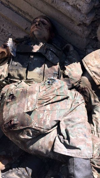 Ermənilərin qoyub qaçdıqları meyitlərin şəkilləri ( +18 )