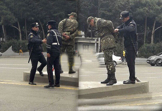 Bakıda yağışla havada polislər əsgərə yardım etdilər – FOTO
