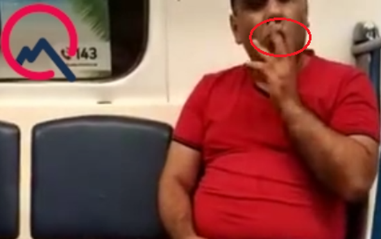 Bakı metrosunda BİABIRÇILIQ: Qatarda siqaret çəkdi - Video