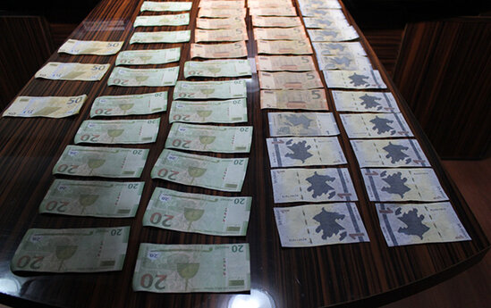 Azərbaycanda saxta pul çap edən sevgililər saxlanıldı - FOTO