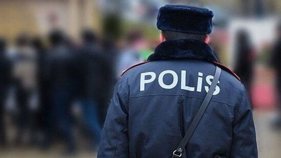 Bakıda polis arvadını restoranın qarşısında döydüyünə görə işdən çıxarıldı