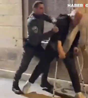 Polisdən fiziki məhdudiyyətli şəxsə qarşı şiddət - VİDEO