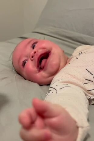 Genetik potologiya ilə doğulan uşaq daima gülümsəyir - FOTO
