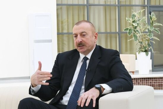 İlham Əliyev Davosda "Adani Group" şirkətinin təsisçisi və sədri ilə görüşüb