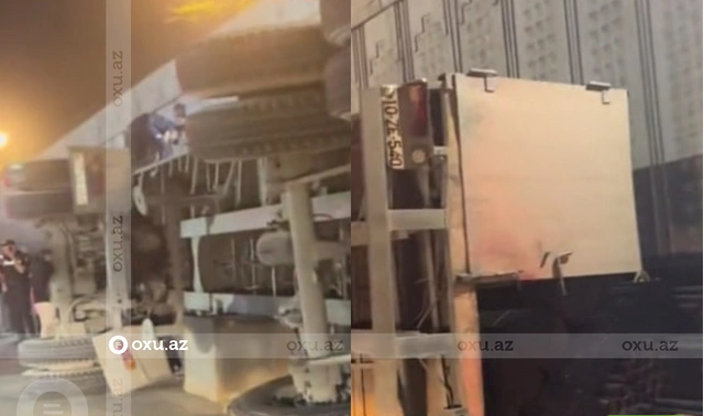 Bakıda gecə saatlarında ağır qəza: Çoxtonnajlı maşın daşıdığı yüklə birlikdə aşdı