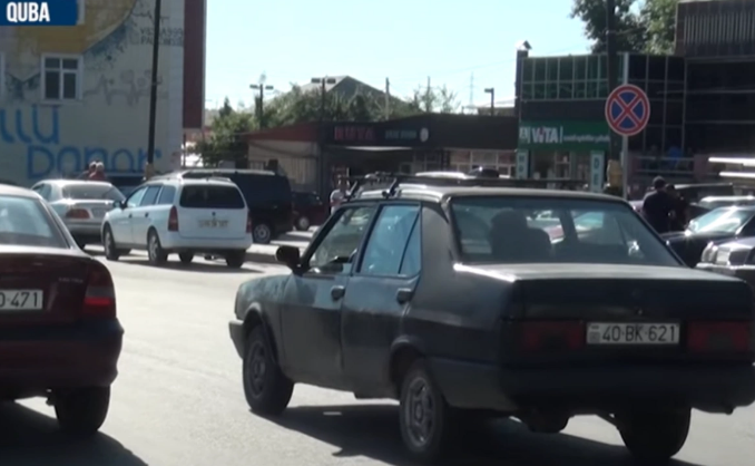 İnsanlar Qubada taksi sürücülərinin dayanacaqları zəbt etməsindən şikayətçidirlər