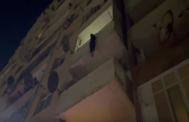 Xırdalanda qadın özünü binadan atmaq istədi - VİDEO
