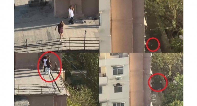 Bakıda qızlar binanın damında içki içib butulkanı insanların başına atdı - VİDEO