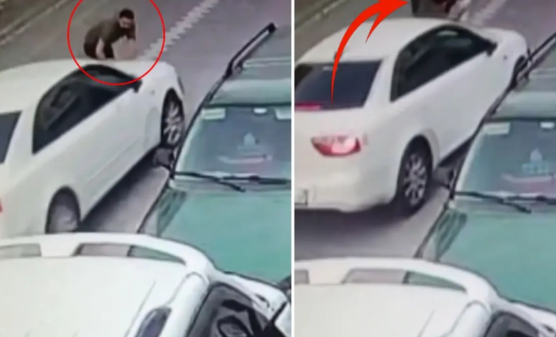 Ata oğlunu xilas etmək üçün özünü maşının qarşısına atdı - VİDEO