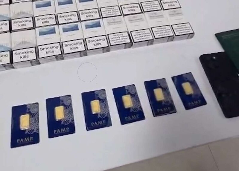 Bakıya gələrkən ayaqqablarından da, telefonundan da qızıl çıxdı - Fotolar