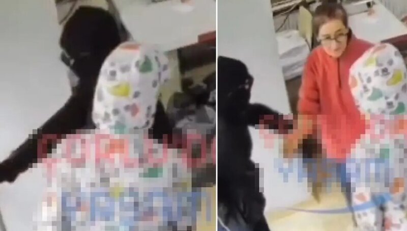 Qadın sahibkar soyğunçulara müqavimət göstərdi: 2 nəfəri şillə ilə qovdu - VİDEO