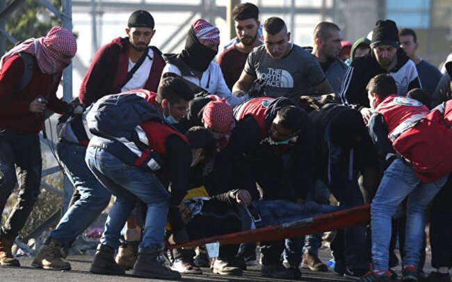 Qəzzada humanitar yardım almaq istəyən 900-ə yaxın fələstinli ölüb