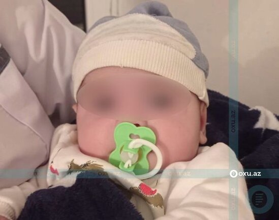 Gəncədə üç aylıq körpə küçəyə atılıb - FOTO
