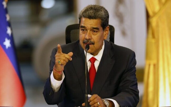 Maduro Salvador hakimiyyətini venesuelalı miqrantlara işgəncə verməkdə ittiham edib