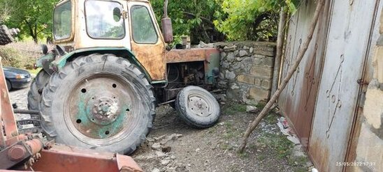 Şəkidə qəzaya düşməmək üçün özünü traktordan atan sürücü öldü - FOTO