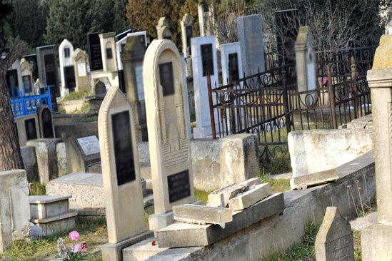 Polis zabiti qəbiristanlıqda İNTİHAR ETDİ