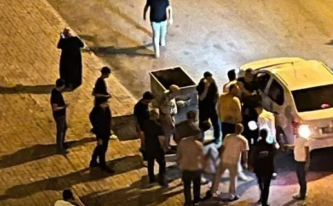 Dava edən silahlıları ayırmaq istəyən ana öldü, oğlu yaralandı