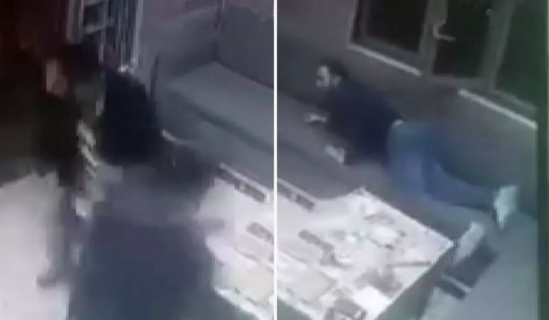 Sərxoş şəxs taksi sürücüsü ilə mübahisə edib ətrafı güllələdi - VİDEO