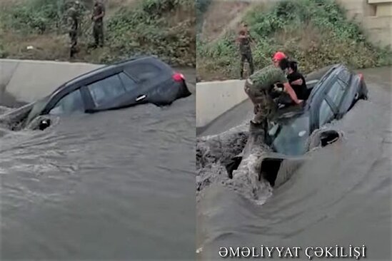 Qubada avtomobil kanala düşdü: Sürücü və sərnişinin xilas edilmə anı - VİDEO