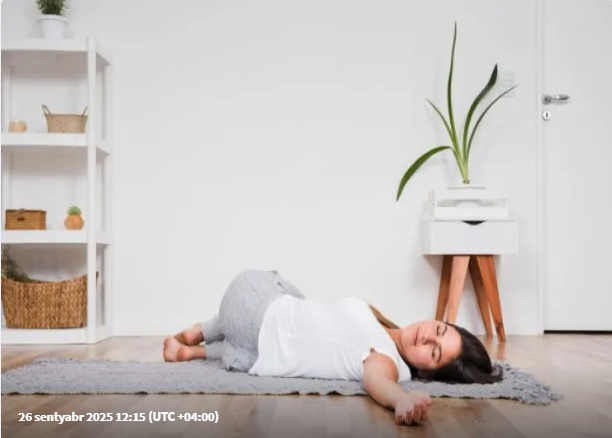 Bel ağrısından qurtulmağa kömək edən ən sadə poza