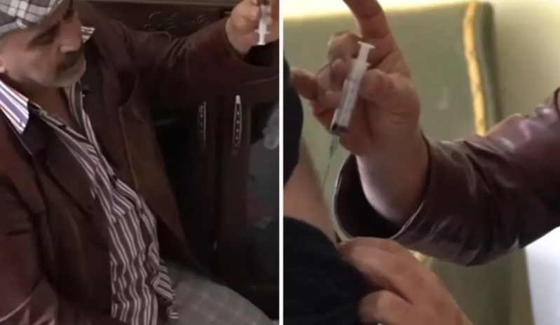 Şprisə doldurduğu çayı gəncin bədəninə batırdı - VİDEO