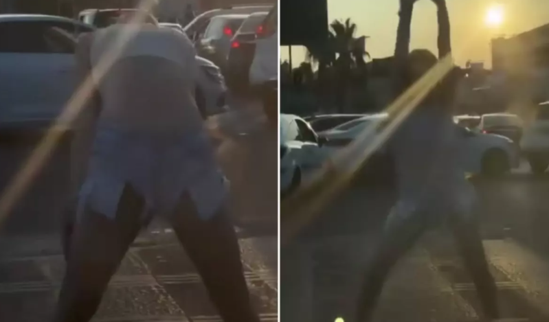 Gənc qadın, maşınlara məhəl qoymadan yolun ortasında rəqs etdi - VİDEO