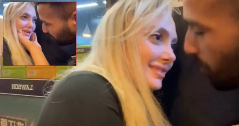 Küçədə canlı yayım edən rus qadını zorla öpməyə çalışdılar - VİDEO